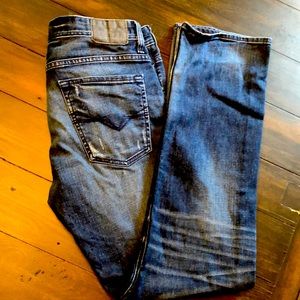 Dark denim blue jeans. My partner bought them and never wore them!